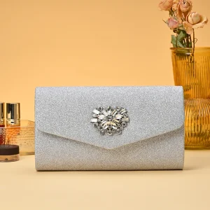 Sac de soirée de mode européenne et américaine : pochette incrustée de diamants argentés associé à un sac de robe de soirée et une chaîne en métal cro