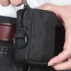 Le sac d&rsquo;accessoires de sac de taille de clé de voiture tactique multifonctionnel, le mini sac de carte et le sac de cigarettes peut être accroché sur la ceinture