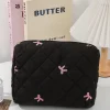 trousse de maquillage portable noire, grande capacité, pochette matelassée avec nœud rose, sac à main pour dames, sac de rangement de toilette de voyage