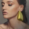 grandes boucles d'oreilles uniques européennes et américaines pour femmes, design géométrique en forme de goutte d'eau, adaptées aux fêtes et aux voyages