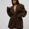 ceinture décontractée ample femmes blazer bouton unique à manches longues revers solide femmes manteaux 2025 automne été dame rue vêtements d'extérieur