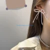 e56a boucles d'oreilles à nœud papillon à mode pour femmes filles, clous à nœud perlé, vêtements confortables à