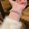bracelet à la mode incrusté de zircon plaqué argent avec design de niche, accessoires de bracelet de bijoux de luxe légers pour femmes