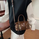 Sac à main Chic pour femmes, sac à bandoulière polyvalent, sac Boston doux au toucher, nouveau Style populaire, sac incliné à une épaule