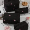 trousse de maquillage portable noire, grande capacité, pochette matelassée avec nœud rose, sac à main pour dames, sac de rangement de toilette de voyage