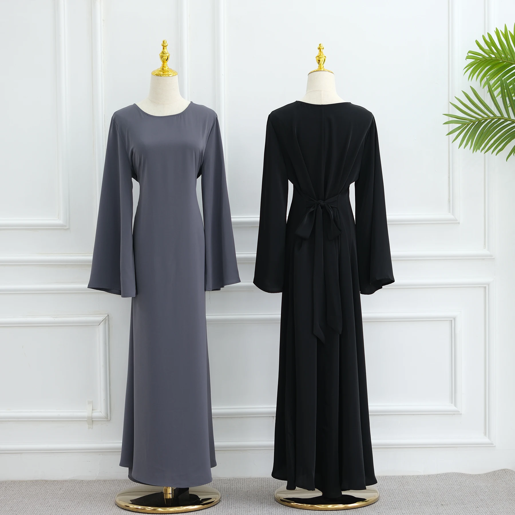 robe abaya élégante hijabi, manches évasées, ceinture intégrée, robe longue pour femmes musulmanes, événement de soirée, vêtements islamiques du ramadan eid dubaï