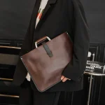 Nouveau sac pour hommes rétro sacs à main en cuir grande mallette d&rsquo;affaires célèbre sac à bandoulière de créateur marque de luxe sac de fichier pour les garçons cool