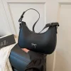 Sac à bandoulière simple pour femmes, style coréen avec décoration d&rsquo;arc, sac à la mode en forme de croissant pour les déplacements décontractés