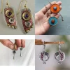Quatre paires de boucles d&rsquo;oreilles peintes de style bohème. Convient à l&rsquo;usage quotidien et à la décoration des femmes Combinaison de bijoux élégante.