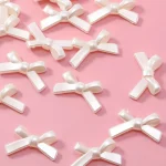 40/50pcs ABS fausses perles de couleur nœud papillon en forme de perles pour la fabrication de bijoux bracelet à bricoler soi-même collier porte-clés accessoires