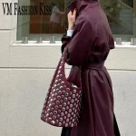 Sacs pour femmes Style Punk embelli Double face rond Rivet incrusté Niche luxe sac seau Chic dame sous les bras sac à bandoulière