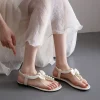chaussures beige été 2025 sans talon diamant chaussures pour femmes sandales plates en caoutchouc pour femme tongs nœud strass taille asiatique h f