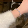 bracelet à la mode incrusté de zircon plaqué argent avec design de niche, accessoires de bracelet de bijoux de luxe légers pour femmes