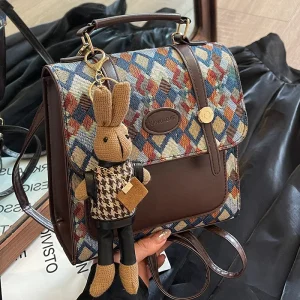 Sac à dos en cuir PU pour femme, design chic, sac à bandoulière Messenger, cartable féminin, style collège, polyvalent, unique initié, nouveau