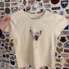 t shirt beige imprimé dessin animé pour femme, haut court, col rond, manches courtes, streetwear, vintage, chic, y2k, été, 2024