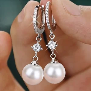 Boucles d’oreilles suspendues en perles pour femmes, accessoires de mariage simples et classiques, vente en gros de bijoux Boucles d’oreilles suspendues en perles pour femmes, accessoires de mariage simples et classiques, vente en gros de bijoux