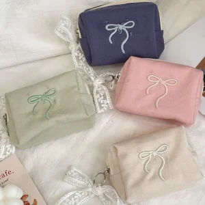 2025 Chic mignon arc trousse de maquillage pour les femmes Portable cosmétique stockage sac à main fermeture éclair trousse de toilette pochette rose