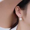 boucles d'oreilles pendantes avec perle, couleur or noble, accessoires d'oreille élégants, bijoux de fête gracieux pour femmes