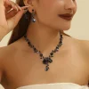 ensemble de bijoux en vigne florale pour femmes, strass scintillants, collier et boucles d'oreilles au design floral élégant, robes de bal de mariage