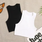 Gilet de yoga – Vêtements de sport pour femmes – Design rayé noir et blanc – Haut à manches courtes – Construction sans couture – Streetwear