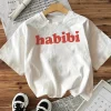 style décontracté utilisation toutes saisons "habibi" lettre rouge imprimé à manches courtes col rond t shirt pour femmes dames t shirts
