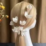 Épingles à cheveux en perles pour femmes, pinces à cheveux à fleurs blanches, accessoires de coiffure de mariée, vente en gros