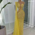 Robes de soirée dorées Dubaï Paillettes Perles Élégant Une épaule illusion taille asabiṁRobe de gala de bal personnalisée