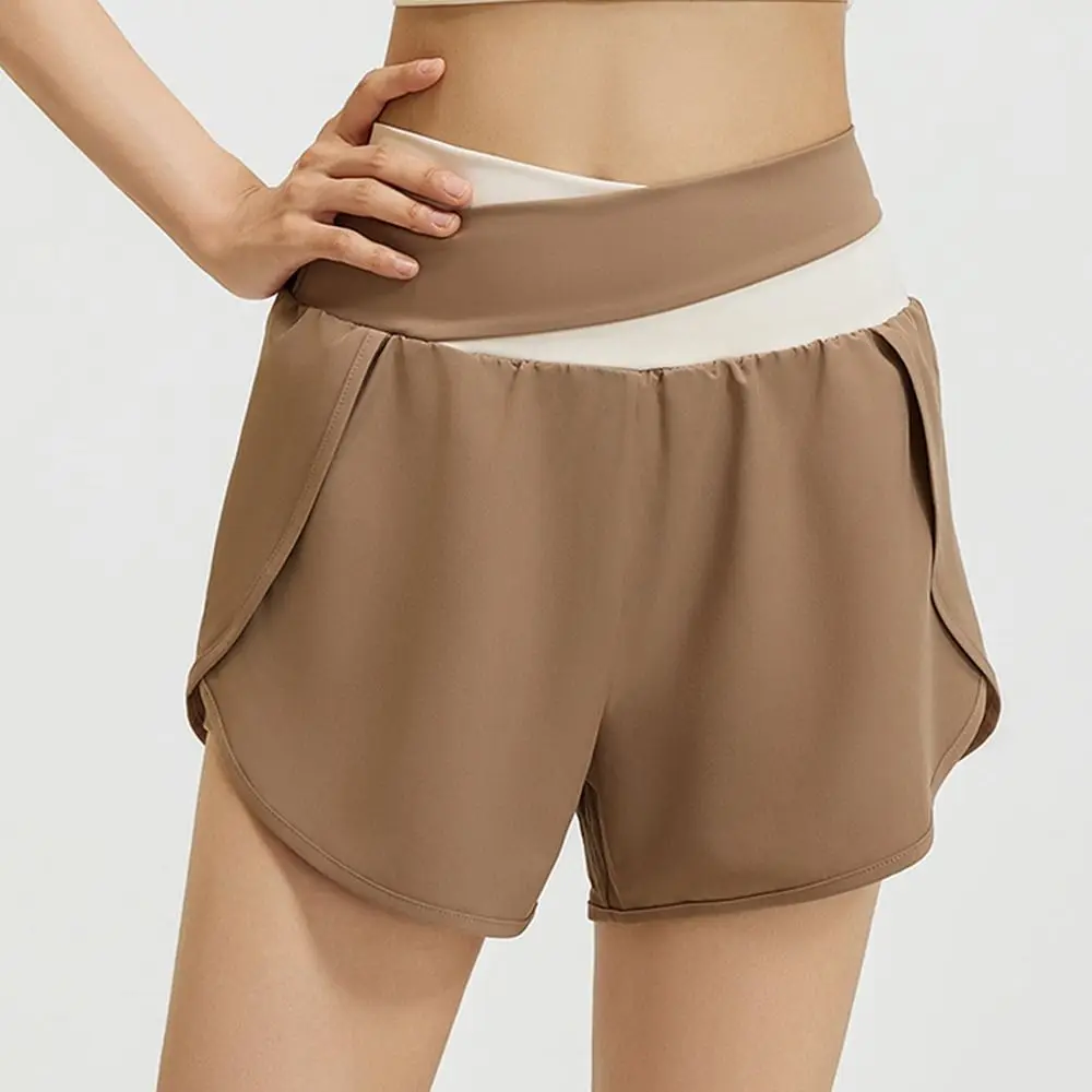 Short de sport respirant pour femmes, ceinture élastique colorée, jupe de Yoga, poches latérales pour téléphone, short de course antidérapant