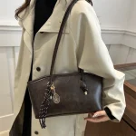 Sac à bandoulière pour femmes, avec longue sangle Spaghetti au Design de nœud, sac à main à pendentif Simple, sac à bandoulière horizontal élégant