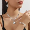 ensemble de bijoux goutte d'eau en cristal strass, bracelet en diamant, boucles d'oreilles à pampilles exquises, collier brillant de luxe pour femmes