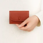 Élégant litchi Grain porte-monnaie pochette courte Ultra mince femmes court portefeuille multi-fonction fermeture éclair en cuir PU porte-carte femmes