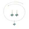 ensemble de bijoux en cuivre plaqué or avec pierres géométriques en zircon bleu, collier et boucles d'oreilles de luxe pour femmes, accents et design élégant