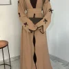 abaya noir islamique élégant de dubaï pour femmes musulmanes, design ceinturé avec nœud détaillé, robe longue modeste pour le moyen orient, nouvelle collection 2025
