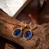 ensemble de bijoux en cuivre plaqué or avec zircone bleue – collier et boucles d'oreilles de luxe pour femmes, accents métalliques élégants