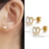 une paire de petites boucles d'oreilles pour femme, boules rondes en or et argent, plusieurs styles pour plusieurs perforations, jolies boucles d'oreilles folles