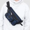 un sac de taille unisexe pratique en tissu nylon avec plusieurs poches pour le sport, la course et un usage élégant, idéal pour les voyages et les affaires