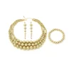 ensemble de bijoux de luxe en perles d'or : collier de déclaration, boucles d'oreilles pendantes et bracelet pour femmes élégantes