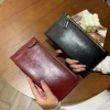 Pochette de luxe en cuir de vache pour hommes et femmes, haut de gamme, décontracté, grande capacité, fermeture éclair, Long portefeuille rétro pour téléphone portable