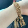 bracelet tressé de blé fait à la main pour femmes, style minimaliste, accessoire décontracté de luxe.