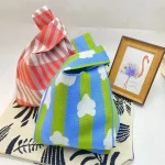 Sac tricoté pour femmes, fourre-tout Portable pratique et exquis, sac de rangement Portable, sacs seau cadeaux, sacs de poignet à nœud pour femmes