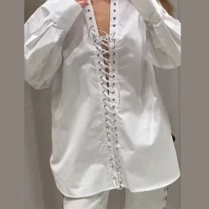 Revers ample évider chemise femme blanc à manches longues pansement à lacets chemises féminines 2025 printemps été mode dame haut rue