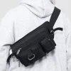 un sac de taille unisexe pratique en tissu nylon avec plusieurs poches pour le sport, la course et un usage élégant, idéal pour les voyages et les affaires