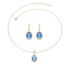 ensemble de bijoux en cuivre plaqué or avec zircone bleue – collier et boucles d'oreilles de luxe pour femmes, accents métalliques élégants