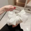 pochette de mariée élégante et tendance, nœud en satin blanc/or, sac à main de soirée, chaîne, sangle d'épaule, poignée en métal, bourse de mariage pour dames