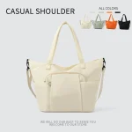 2025 Nouveau sac fourre-tout beige mode femme photographie de rue sac à bandoulière grande capacité le plus facile pour le sac à main de déplacement assorti