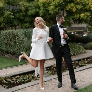 Robe De mariée trapèze avec nœud élégant pour femmes, col rond, manches longues, dos ouvert, au-dessus du genou, plissée, personnalisée