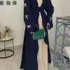 abaya noir islamique élégant de dubaï pour femmes musulmanes, design ceinturé avec nœud détaillé, robe longue modeste pour le moyen orient, nouvelle collection 2025