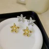 boucles d'oreilles à fleurs élégantes pour femmes à mode