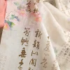 jingzhou impression de calligraphie et embaude robe, trois beiges possèdent un motif de champ, un motif de pulvérisation directe, un tissu de créateur