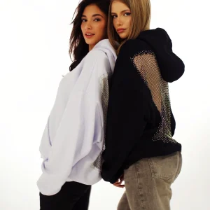 Le sweat à capuche Harajuku est de retour dans la tendance d&rsquo;automne des femmes. C&rsquo;est un sweat à capuche dos nu découpé de style rue